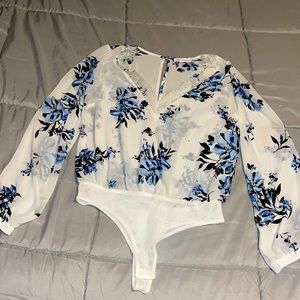 Blue and white floral brand new without tags bodysuit